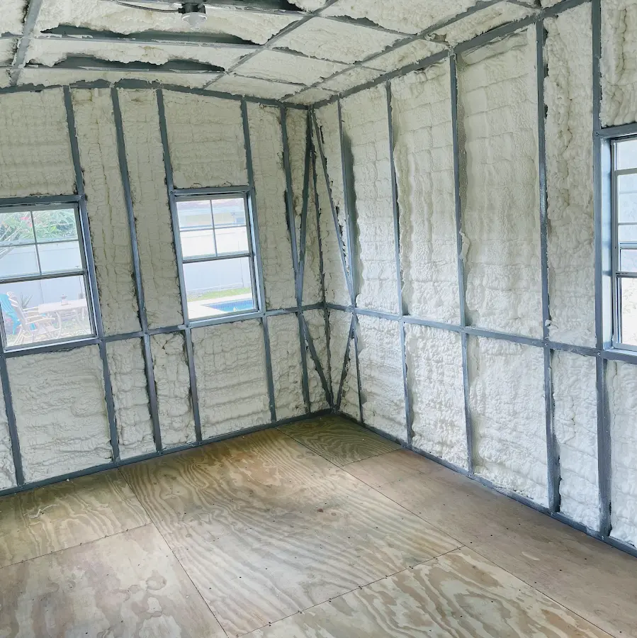 Closed-cell spray foam insulation applied to wall cavities in a residential project in Gillette